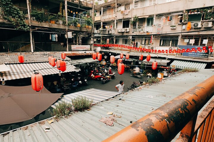 Narrow Saigon alley with red lanterns. Neighbourhood streets where the best local food stalls are found